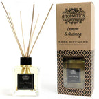 A "Lemon & Nutmeg" reed diffuser and its brown cardboard box displayed side-by-side on a white background. The diffuser bottle has a black label and wooden reeds.