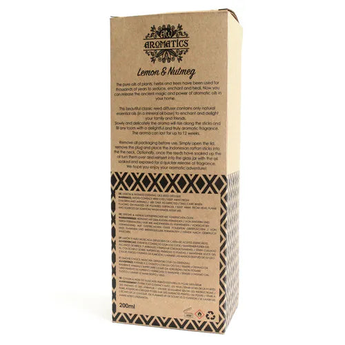 A detailed close-up of the back of the "Lemon & Nutmeg" reed diffuser box. The surface shows a product description, instructions for use, and safety warnings printed in multiple languages.