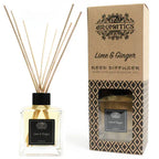 A "Lime & Ginger" reed diffuser and its brown cardboard box displayed side-by-side on a white background. The diffuser bottle has a black label and wooden reeds.