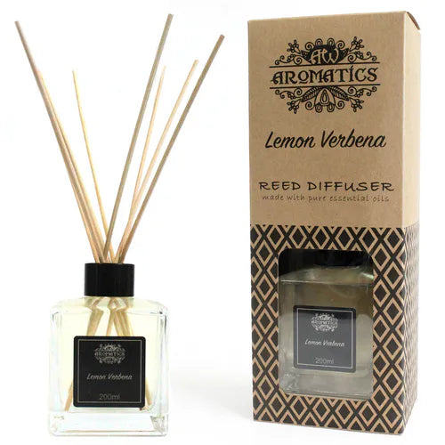 A "Lemon Verbena" reed diffuser bottle and its brown cardboard box displayed side-by-side on a white background. The diffuser bottle and the packaging are both clearly visible.