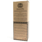 A detailed view of the back of a brown cardboard box for a "Geranium & Rose" reed diffuser. The box shows a product description, instructions for use, and safety warnings printed in multiple languages.
