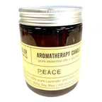 Brown glass jar candle with silver lid labeled “Aromatherapy Candle – Peace” made with 100% pure lavender and geranium essential oils, 200g soy wax, 40h burning time.