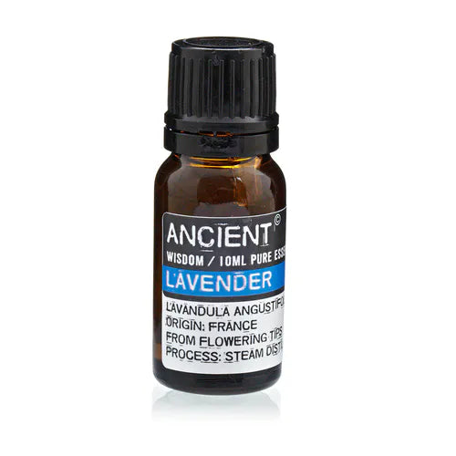 Small amber glass bottle of Ancient Wisdom lavender essential oil, labeled with origin from France and details about steam distillation process.