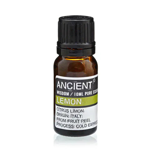 Amber glass bottle of Ancient Wisdom lemon essential oil, labeled with Citrus limon, origin Italy, extracted from fruit peel by cold expression.