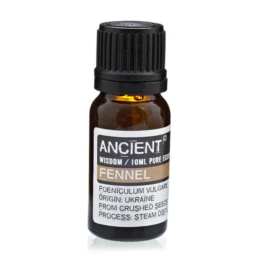 Amber glass bottle of Ancient Wisdom fennel essential oil, labeled with Foeniculum vulgare, origin Ukraine, extracted from crushed seeds by steam distillation.