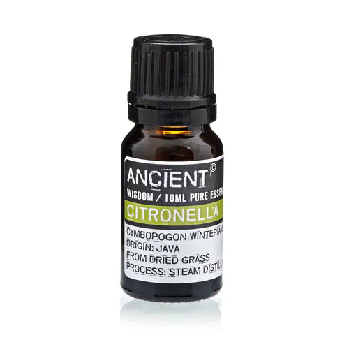 Amber glass bottle of Ancient Wisdom citronella essential oil, labeled with Cymbopogon winterianus, origin Java, extracted from dried grass by steam distillation.