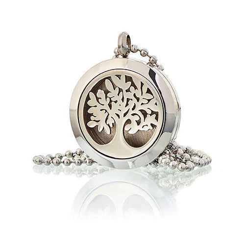 Silver essential oil diffuser pendant necklace with a Tree of Life design and ball chain.