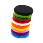 Stack of colorful round felt pads for aromatherapy lockets and diffuser jewelry