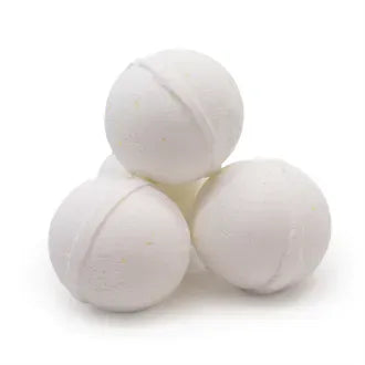 Four plain white bath bombs stacked together in a pyramid shape. The bath bombs have a smooth, matte surface with subtle seam lines visible around their circumference. Their clean and minimal look emphasizes purity and simplicity.