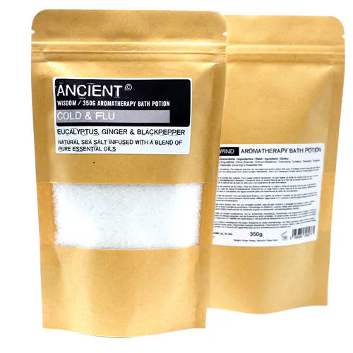 Front and back view of Ancient Wisdom Aromatherapy Bath Potion “Cold & Flu” with eucalyptus, ginger, and black pepper, packaged in a brown kraft resealable pouch with a transparent window showing white bath salts.