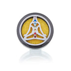 Front view of a silver car diffuser clip featuring a meditation figure with embedded colorful crystals symbolizing the seven chakras, contrasted against a bright yellow felt pad. A harmonious blend of wellness, design, and luxury for aromatherapy on the go.