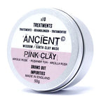 Round silver tin of Ancient Wisdom Earth Clay Mask in Pink Clay. The lid features a half-pink label with text indicating “Pink Clay,” “Draws out impurities,” and “Made in England.” The container is 50g and designed for 10 treatments.