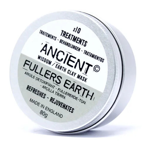 Tin of Ancient Wisdom Earth Clay Mask, labeled "Fullers Earth," 80g. The silver container has a white and pale green label that highlights its detoxifying, refreshing, and rejuvenating properties. Text is presented in multiple languages.