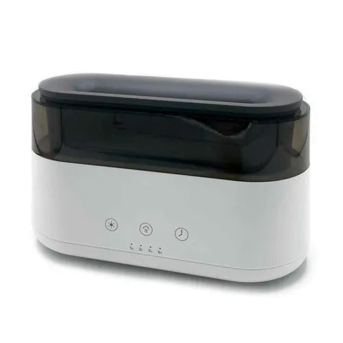 White rectangular aroma diffuser with black transparent top cover and three control buttons on the front, photographed against a plain background.