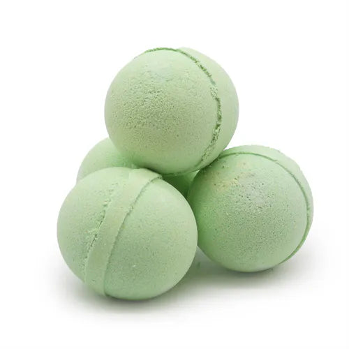 Four light green spherical bath bombs stacked in a pyramid shape, with a fine powdery texture and visible seam lines around the center, displayed on a clean white studio background.
