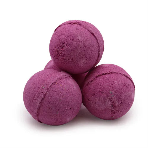 Group of four deep purple bath bombs with a grainy, slightly uneven texture and clear seam lines, arranged in a compact pyramid formation on a white background.Group of four deep purple bath bombs with a grainy, slightly uneven texture and clear seam lines, arranged in a compact pyramid formation on a white background.