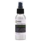 Close-up of an aluminum spray bottle labeled “Ancient Wisdom Aromatherapy Mist – May Chang & Bergamot.” The 100ml (3.5 fl oz) bottle features a white label with black and green text, a black spray cap, and sits against a plain white background.