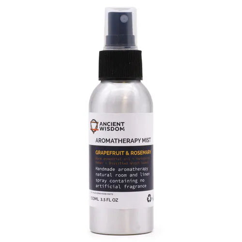 100 ml aluminum spray bottle from Ancient Wisdom Aromatherapy Mist Grapefruit & Rosemary, with black spray cap and white and black label. The label indicates that it is a handmade product with pure essential oils, Yorkshire water and distilled witch hazel, without artificial fragrances. The bottle is photographed on a simple white background.