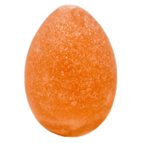 Egg-shaped Himalayan pink salt deodorant stone isolated on white background.