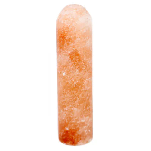 Cylindrical Himalayan pink salt deodorant stone isolated on white background.