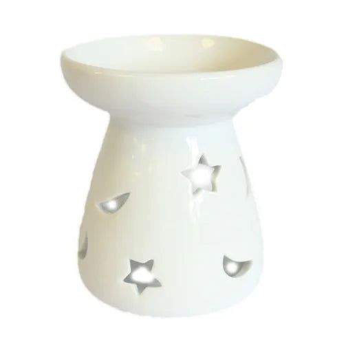 elegant, white ceramic oil burner with a sleek, glossy finish. The cone-shaped body of the burner is adorned with multiple cutouts in the shape of stars and crescent moons, allowing light to shine through when a candle is placed inside. The top features a wide, shallow bowl for holding essential oils or wax melts. Photographed against a pure white background, minimalist design for home fragrance and aromatherapy.
