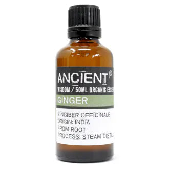 Amber glass bottle labeled 'Ancient Wisdom Organic Essential Oil Ginger 50ml,' origin India, made from root, steam distilled.